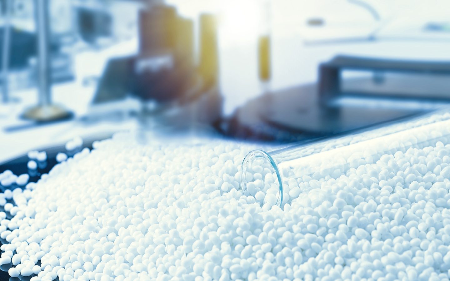 picture of overturned test tube spilling plastic beads