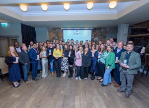 All 38 winners of Scottish Edge 2023 standing in a semi-circle