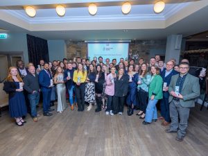 All 38 winners of Scottish Edge 2023 standing in a semi-circle