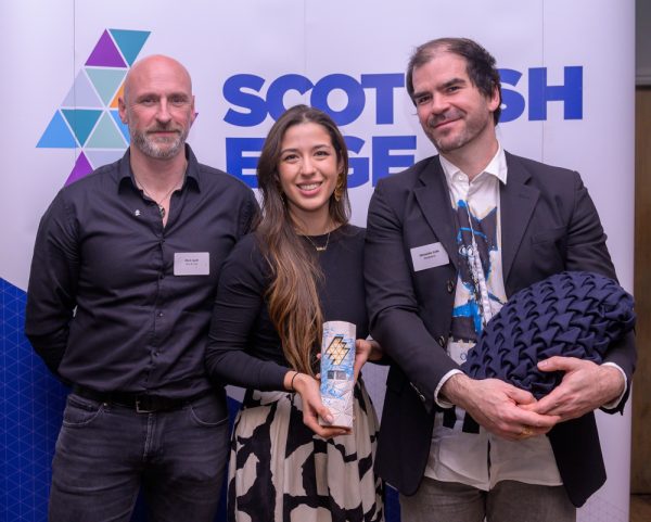 Mark Scott of Bella Duke, BOROBOSCOT's Camila Juminez and Alexandre Colle standing in front of a Scottish Edge banner