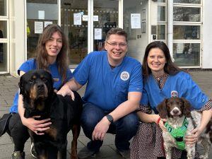 The CanCan Diagnostics team with founder Dr Maciej Parys and two dogs