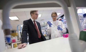 Prof Quentin Anstee of Newcastle University with a lab technician in a lab
